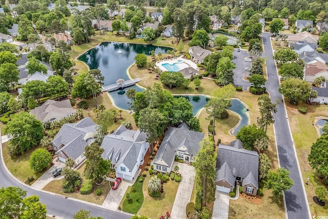 67 Camden Cir, Pawleys Island, SC 29585 - aerial view of property and surrounding area with nearby suburban area, a nearby body of water, and a pool area
