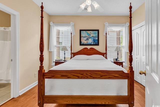 67 Camden Cir, Pawleys Island, SC 29585 - bedroom with light wood-style floors, a closet, ceiling fan, and baseboards