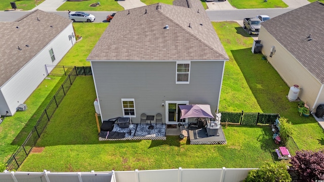 348 Hidden Cove Dr, Little River, SC 29566 - back of property featuring roof with shingles and a patio