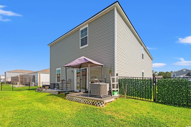 348 Hidden Cove Dr, Little River, SC 29566 - back of property with a wooden deck and central AC unit