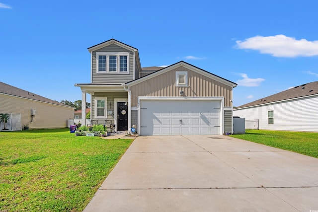 348 Hidden Cove Dr, Little River, SC 29566 - view of front of property featuring board and batten siding, a front yard, a garage, and concrete driveway