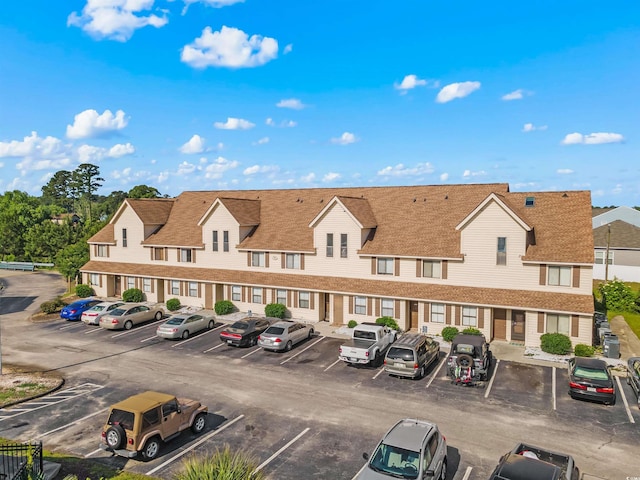 510 Fairwood Lakes Dr Unit 19-Q, Myrtle Beach, SC 29588 - view of building exterior featuring uncovered parking and a residential view