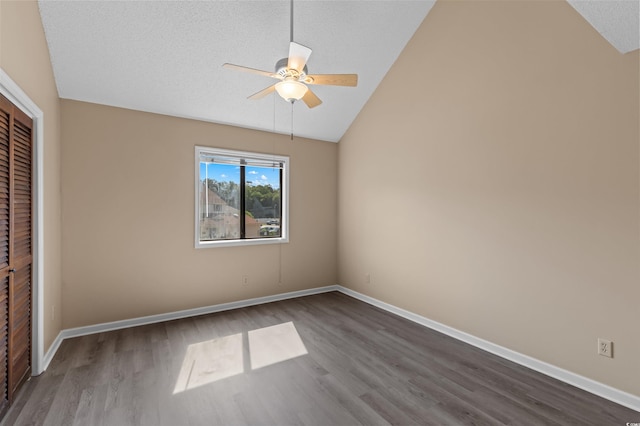 510 Fairwood Lakes Dr Unit 19-Q, Myrtle Beach, SC 29588 - unfurnished bedroom with vaulted ceiling, dark wood-style flooring, a closet, baseboards, and ceiling fan