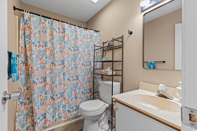 510 Fairwood Lakes Dr Unit 19-Q, Myrtle Beach, SC 29588 - full bathroom with toilet, vanity, curtained shower, wood finished floors, and a textured ceiling
