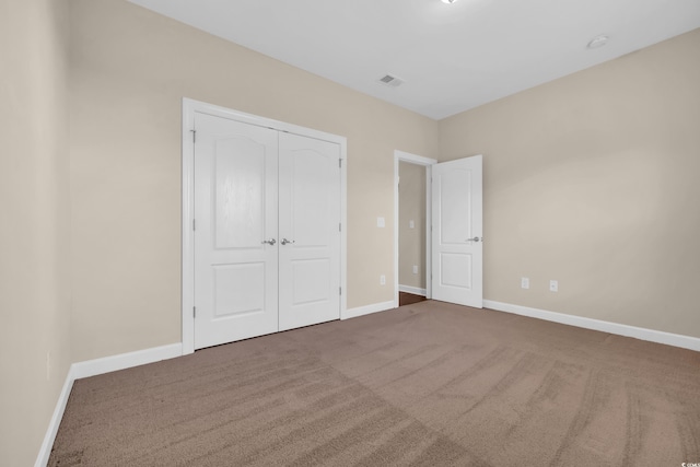 644 Harbor Bay Dr, Murrells Inlet, SC 29576 - unfurnished bedroom featuring carpet floors, baseboards, and a closet
