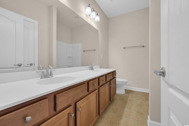 644 Harbor Bay Dr, Murrells Inlet, SC 29576 - bathroom with double vanity, toilet, tile patterned floors, baseboards, and a shower