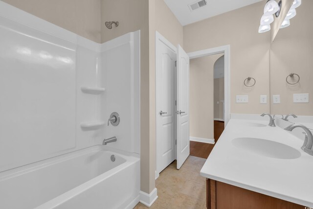 644 Harbor Bay Dr, Murrells Inlet, SC 29576 - full bath with bathing tub / shower combination, double vanity, and baseboards