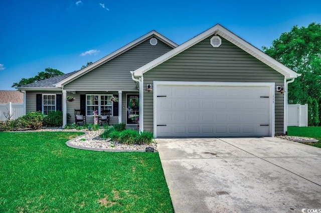 ranch-style house with driveway and a garage