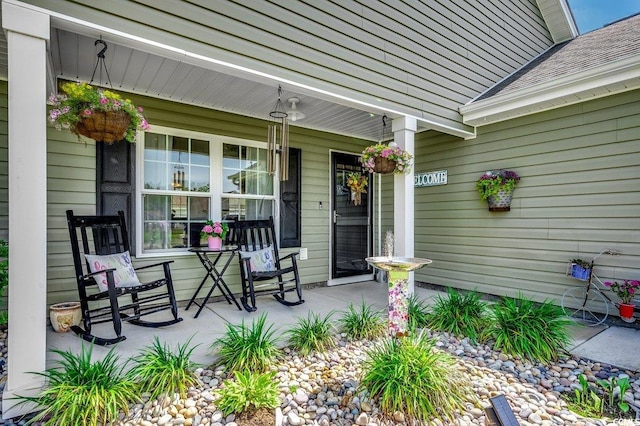 entrance to property featuring covered porch