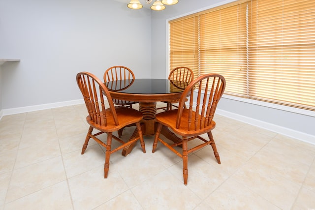 249 Ashepoo Creek Dr, Myrtle Beach, SC 29579 - dining space featuring baseboards, a chandelier, and light tile patterned floors