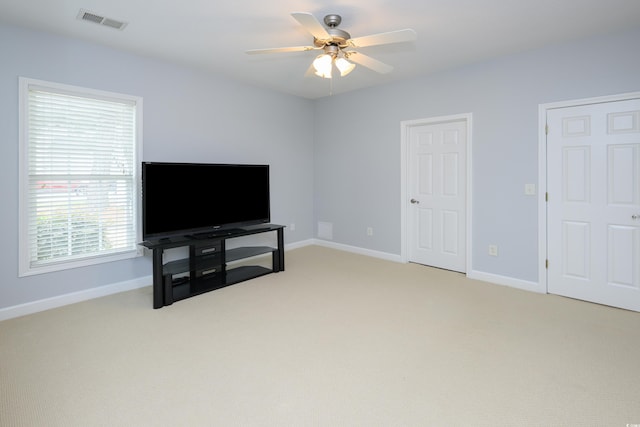 249 Ashepoo Creek Dr, Myrtle Beach, SC 29579 - unfurnished living room featuring a ceiling fan, baseboards, and light colored carpet