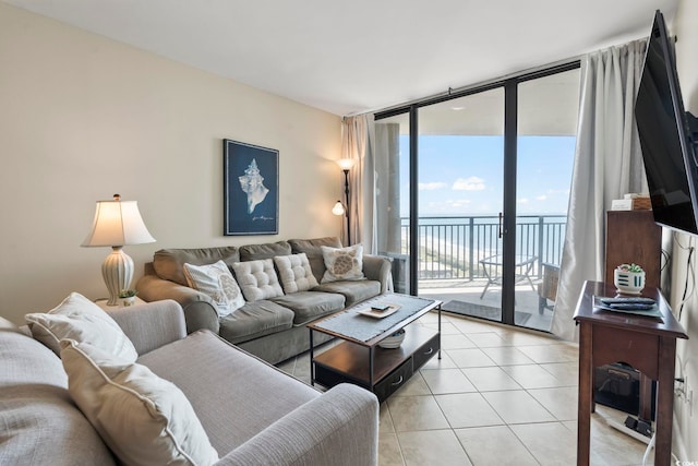 5523 N Ocean Blvd Unit 1903, Myrtle Beach, SC 29577 - living room with a wall of windows and light tile patterned flooring