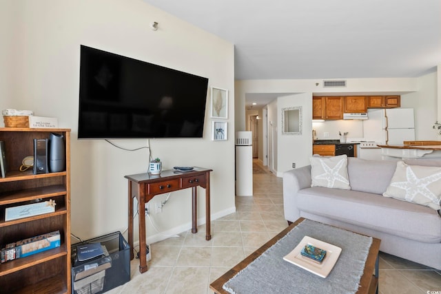 5523 N Ocean Blvd Unit 1903, Myrtle Beach, SC 29577 - living room with light tile patterned floors and baseboards