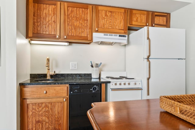 5523 N Ocean Blvd Unit 1903, Myrtle Beach, SC 29577 - kitchen featuring under cabinet range hood, white appliances, a sink, and brown cabinetry