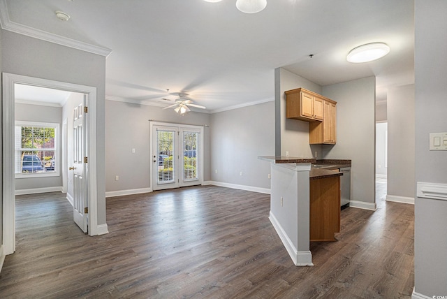 2029 Silvercrest Dr Unit 22B, Myrtle Beach, SC 29579 - kitchen with dark countertops, plenty of natural light, crown molding, ceiling fan, and baseboards