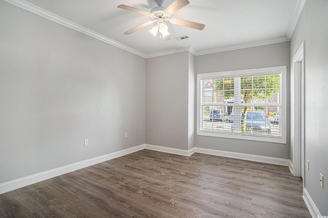 2029 Silvercrest Dr Unit 22B, Myrtle Beach, SC 29579 - empty room featuring dark wood-type flooring, crown molding, baseboards, and ceiling fan