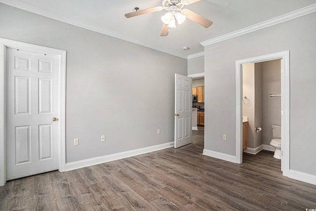 2029 Silvercrest Dr Unit 22B, Myrtle Beach, SC 29579 - unfurnished bedroom with crown molding, dark wood-style flooring, baseboards, and ensuite bath