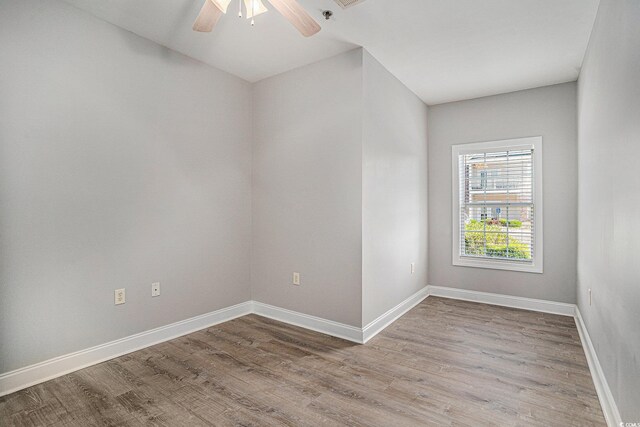2029 Silvercrest Dr Unit 22B, Myrtle Beach, SC 29579 - unfurnished room with a ceiling fan, wood finished floors, and baseboards
