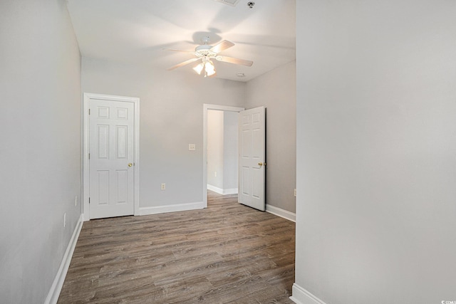 2029 Silvercrest Dr Unit 22B, Myrtle Beach, SC 29579 - spare room featuring a ceiling fan, wood finished floors, and baseboards