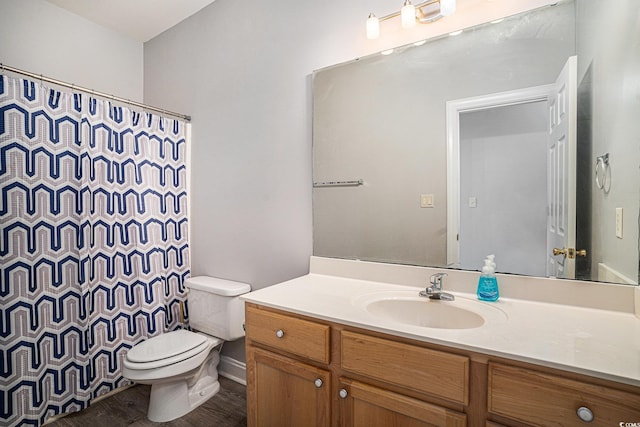 2029 Silvercrest Dr Unit 22B, Myrtle Beach, SC 29579 - bathroom featuring toilet, vanity, wood finished floors, and a shower with shower curtain