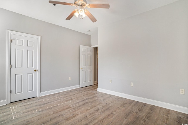 2029 Silvercrest Dr Unit 22B, Myrtle Beach, SC 29579 - unfurnished bedroom featuring wood finished floors, baseboards, and a ceiling fan