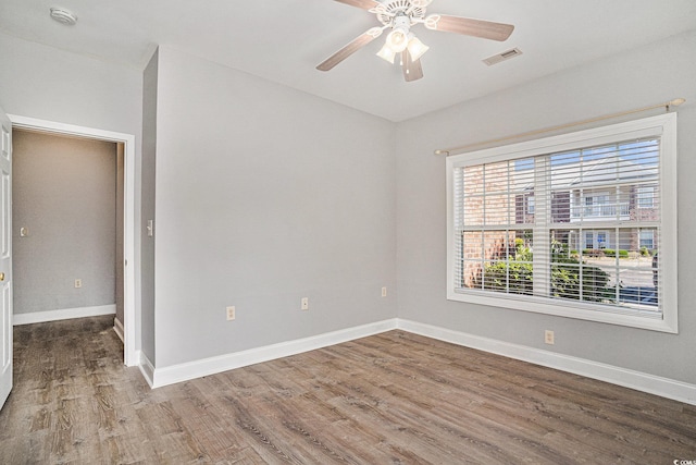 2029 Silvercrest Dr Unit 22B, Myrtle Beach, SC 29579 - unfurnished room featuring a smoke detector, wood finished floors, baseboards, and ceiling fan