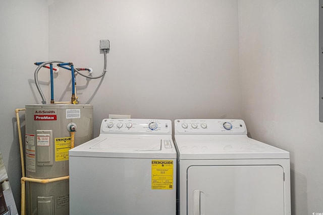 2029 Silvercrest Dr Unit 22B, Myrtle Beach, SC 29579 - laundry area with water heater and washing machine and clothes dryer