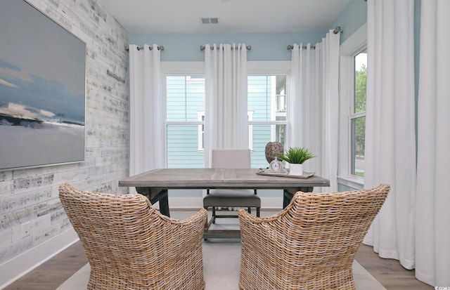 812 Maltby Aly, Myrtle Beach, SC 29588 - dining space featuring an accent wall and wood finished floors
