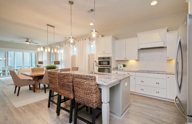 812 Maltby Aly, Myrtle Beach, SC 29588 - kitchen with stainless steel appliances, decorative backsplash, custom exhaust hood, a ceiling fan, and recessed lighting