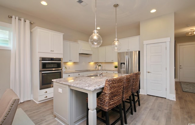 812 Maltby Aly, Myrtle Beach, SC 29588 - kitchen with white cabinets, stainless steel appliances, light wood-style floors, and recessed lighting