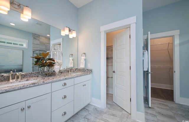 812 Maltby Aly, Myrtle Beach, SC 29588 - bathroom featuring double vanity and a spacious closet