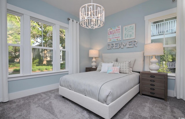 812 Maltby Aly, Myrtle Beach, SC 29588 - carpeted bedroom with a chandelier and baseboards