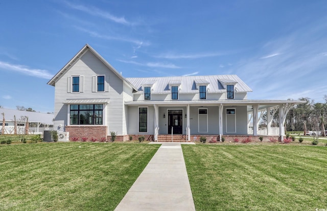 812 Maltby Aly, Myrtle Beach, SC 29588 - modern farmhouse with a standing seam roof, a metal roof, a front lawn, and covered porch