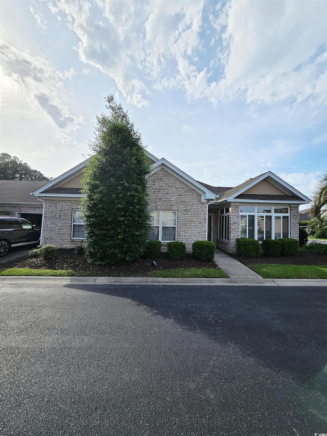 1426 Saint Thomas Cir Unit A 3, Myrtle Beach, SC 29577 - view of front facade featuring brick siding