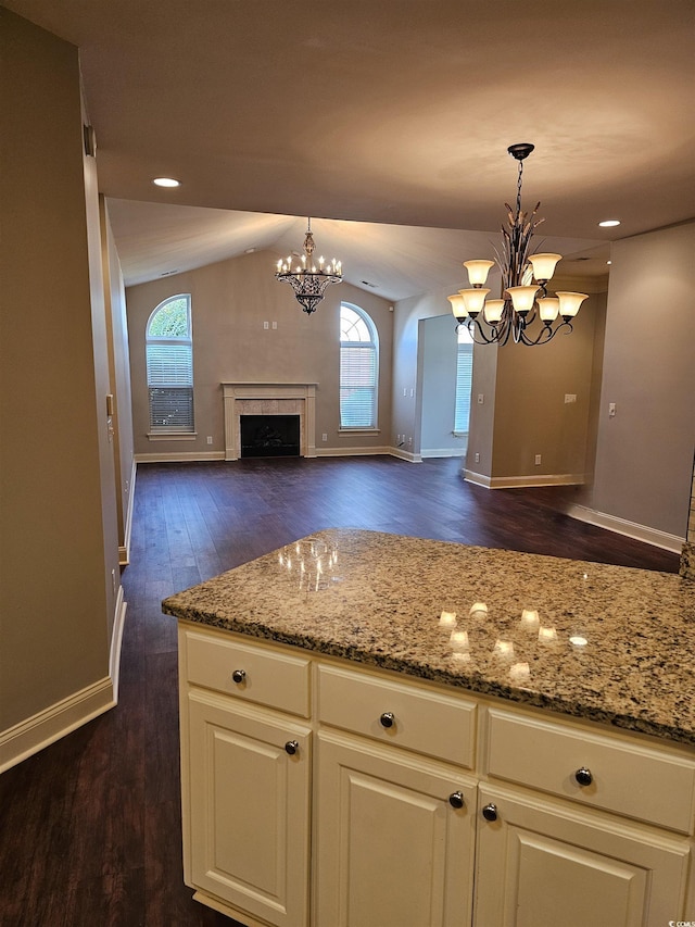 1426 Saint Thomas Cir Unit A 3, Myrtle Beach, SC 29577 - kitchen with a chandelier, dark wood-style flooring, baseboards, light stone counters, and open floor plan