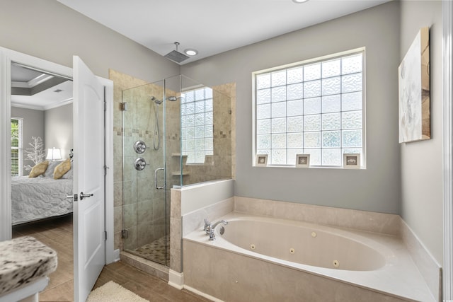 full bathroom featuring a stall shower, connected bathroom, crown molding, and a whirlpool tub