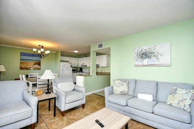 5905 S Kings Hwy Unit 116B, Myrtle Beach, SC 29575 - living room featuring a chandelier and light tile patterned floors