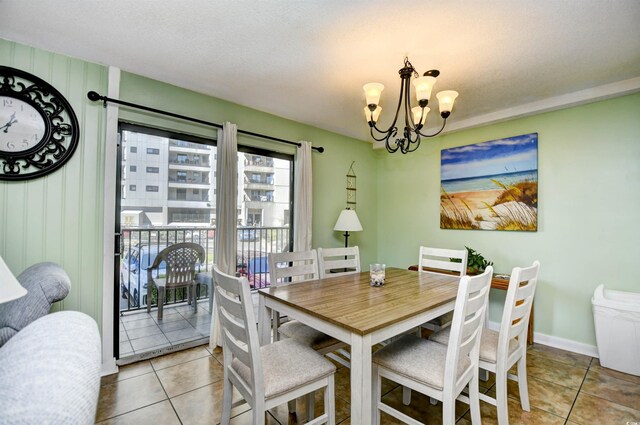 5905 S Kings Hwy Unit 116B, Myrtle Beach, SC 29575 - dining room with a chandelier and light tile patterned floors