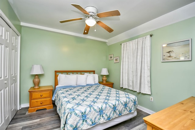 5905 S Kings Hwy Unit 116B, Myrtle Beach, SC 29575 - bedroom with a closet, wood finished floors, baseboards, and ceiling fan
