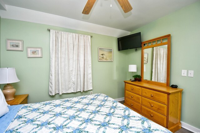 5905 S Kings Hwy Unit 116B, Myrtle Beach, SC 29575 - bedroom featuring baseboards and ceiling fan