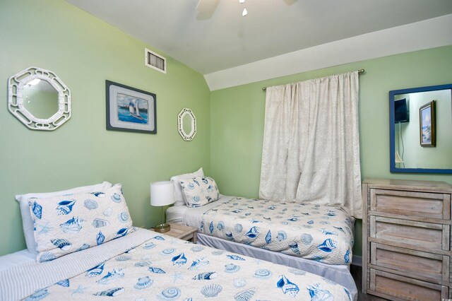 5905 S Kings Hwy Unit 116B, Myrtle Beach, SC 29575 - bedroom with lofted ceiling and a ceiling fan
