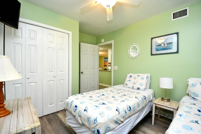 5905 S Kings Hwy Unit 116B, Myrtle Beach, SC 29575 - bedroom with a closet, wood finished floors, a ceiling fan, and baseboards