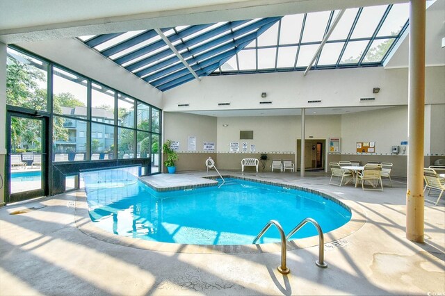 5905 S Kings Hwy Unit 116B, Myrtle Beach, SC 29575 - indoor community pool featuring a skylight
