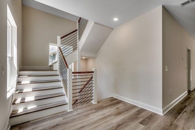 1673 Carriage Ln, Little River, SC 29566 - staircase with wood finished floors, recessed lighting, and baseboards
