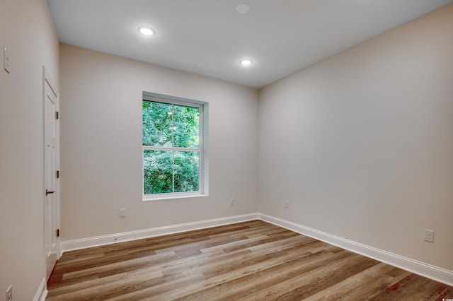 1673 Carriage Ln, Little River, SC 29566 - spare room featuring light wood finished floors, baseboards, and recessed lighting