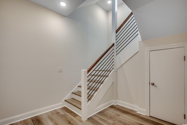1673 Carriage Ln, Little River, SC 29566 - stairs with wood finished floors and recessed lighting