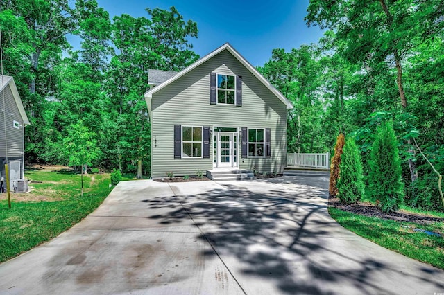 1673 Carriage Ln, Little River, SC 29566 - traditional-style house with central air condition unit