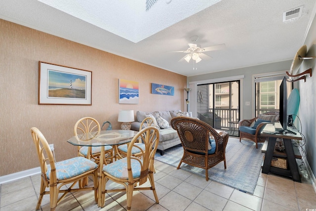 210 N Ocean Blvd Unit 333, North Myrtle Beach, SC 29582 - dining space featuring a ceiling fan, a textured ceiling, and light tile patterned flooring