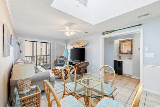 210 N Ocean Blvd Unit 333, North Myrtle Beach, SC 29582 - dining space with a textured ceiling, light tile patterned floors, and ceiling fan