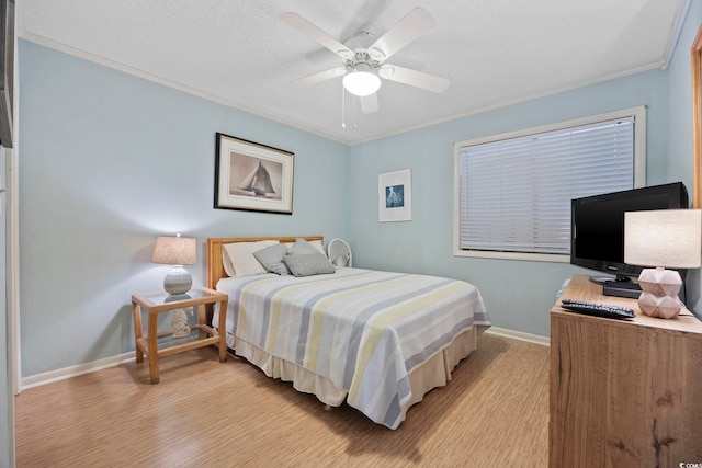 210 N Ocean Blvd Unit 333, North Myrtle Beach, SC 29582 - bedroom featuring ornamental molding, ceiling fan, and light wood-style floors